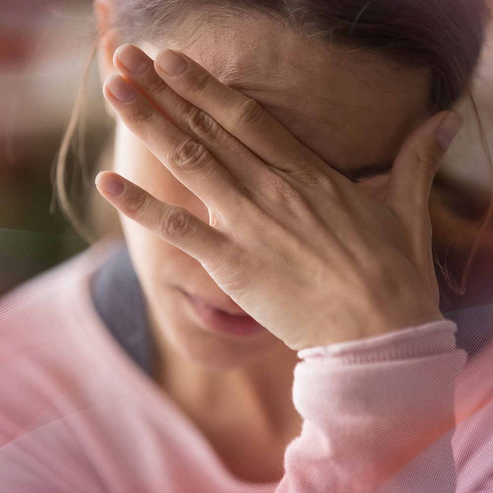 woman-holding-head-in-shame